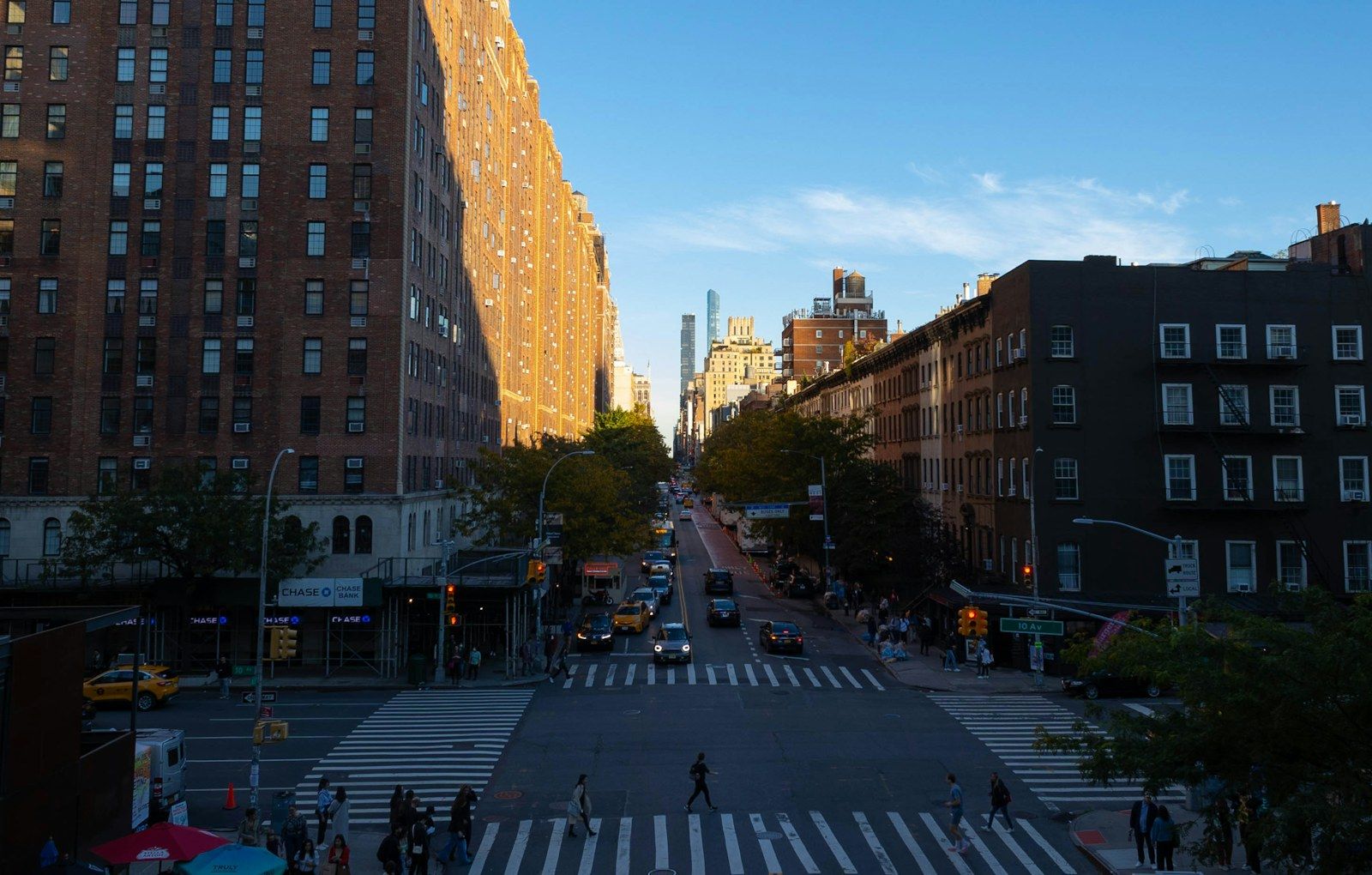 Golden hour over a Chelsea avenue, seen from the High Line
