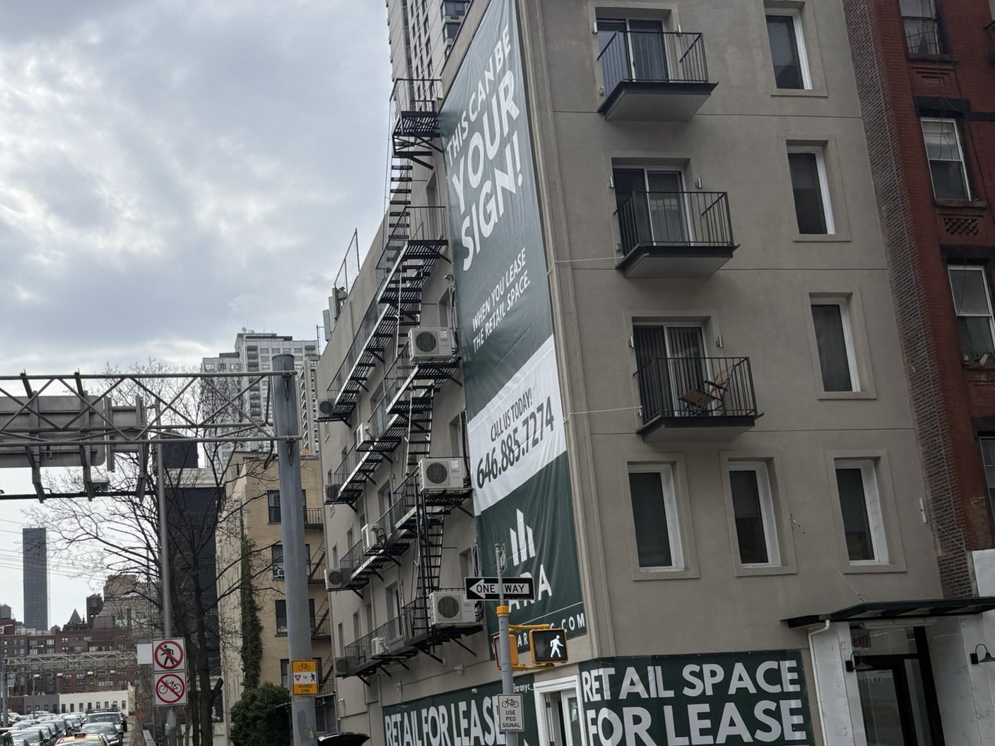 ARA retail-for-lease banners on 318 East 62nd Street